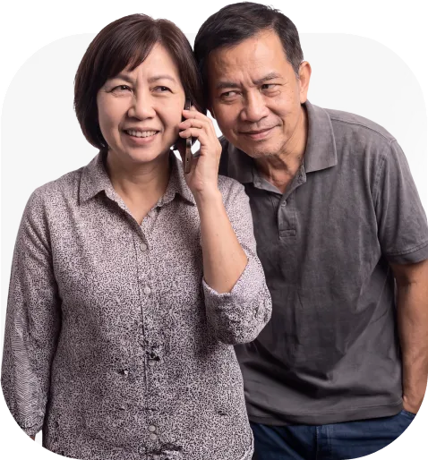 Couple smiling on a phone call